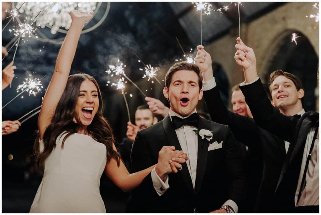 G ALXNDR clients enjoying their wedding day through a sparkler exit